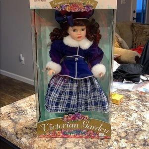 Collectible porcelain doll 18”